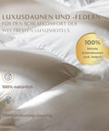 Nahaufnahme des Excellence Natürlicher Topper mit bauschiger Naturfüllung und weichem Bezug für luxuriösen Schlafkomfort.