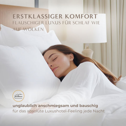 Entspannt schlafende Frau auf einem Excellence Topper Federfrei, der durch seine flauschige federfreie Füllung hohen Liegekomfort bietet.